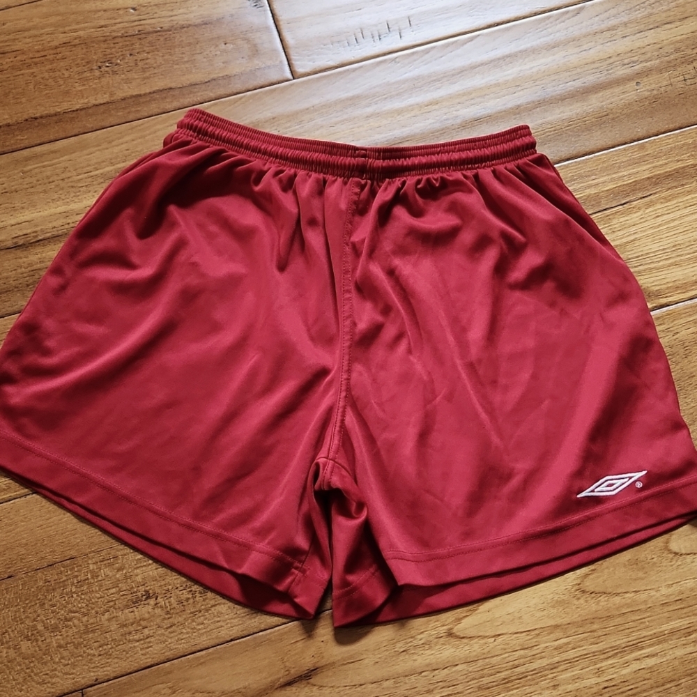 Red Umbro shorts, women's large